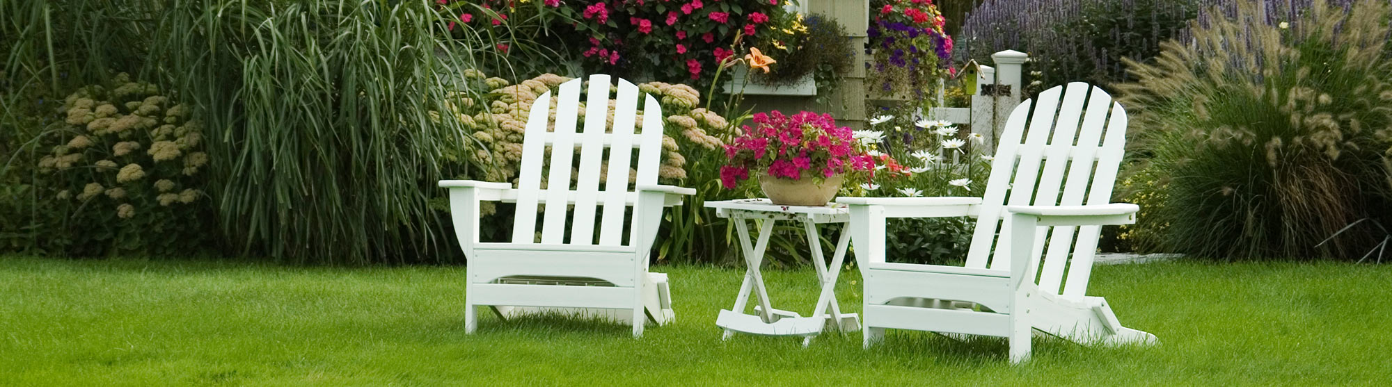 White chairs in yard